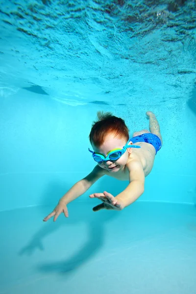 depositphotos_181483750-stock-photo-little-boy-glasses-swimming-dives